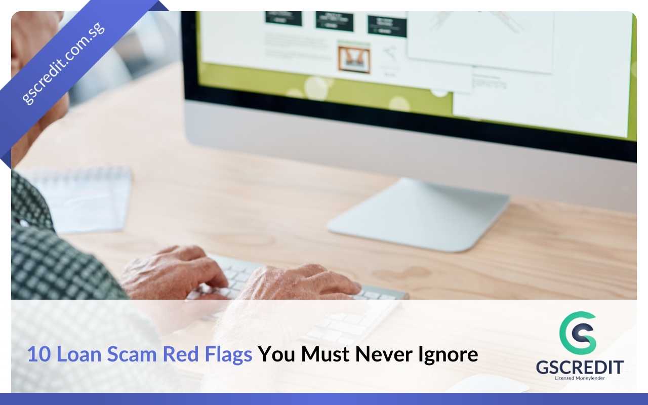 Person using a computer to research loan scam red flags in Singapore before borrowing